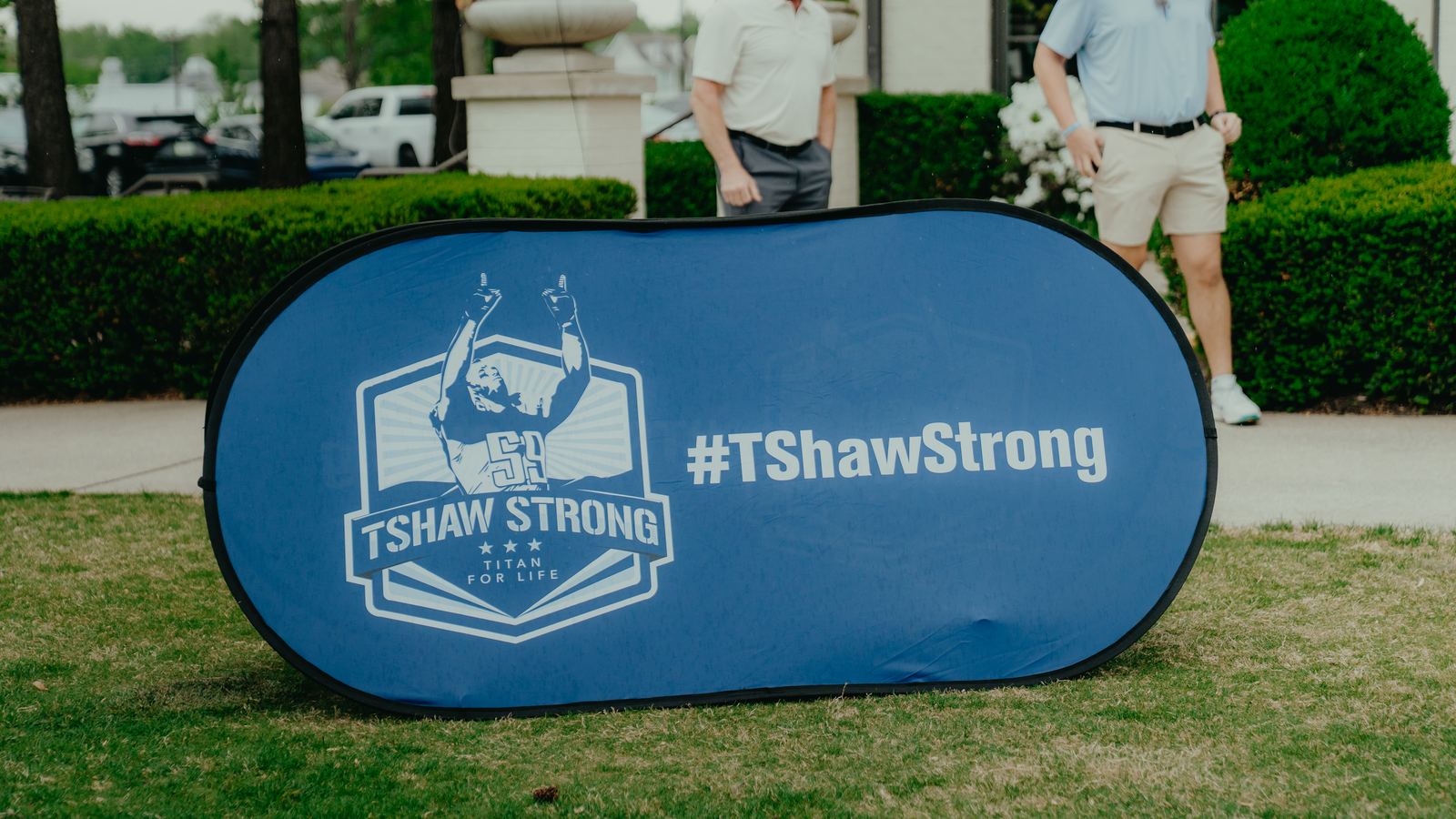 A TShaw Strong banner on the course at Westhaven Golf Club, carrying the crest and the hashtag #TShawStrong.